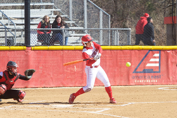 Dr. Lauren Kamachi a girl hitting a softball playing division one sport at Stonybrook University – Sports Vision therapy - Athletic performance - Binocular-vision