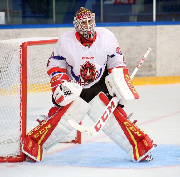 Photo of hockey players in puck drop face off - Vision therapy – Senaptec sensory – Athletic performance 